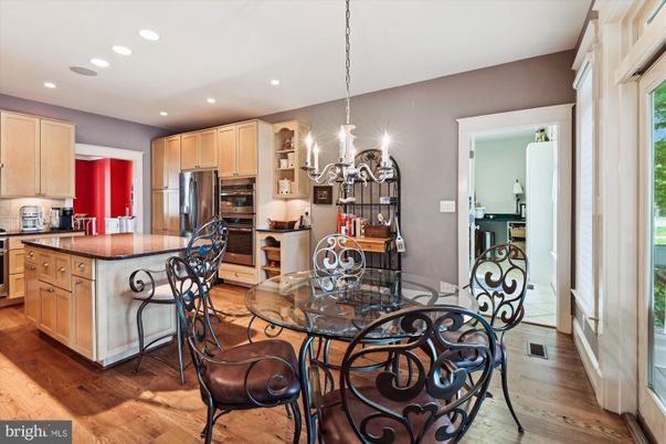 Chandelier, Dining room, Interior, Kitchen, Recessed Lighting, Stainless Steel Appliances, Wood Texture Flooring