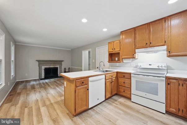Fireplace, Interior, Kitchen, Recessed Lighting, Wood Texture Flooring