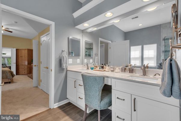 Bathroom, Dual Sink Vanities, Interior, Recessed Lighting, Wood Texture Flooring