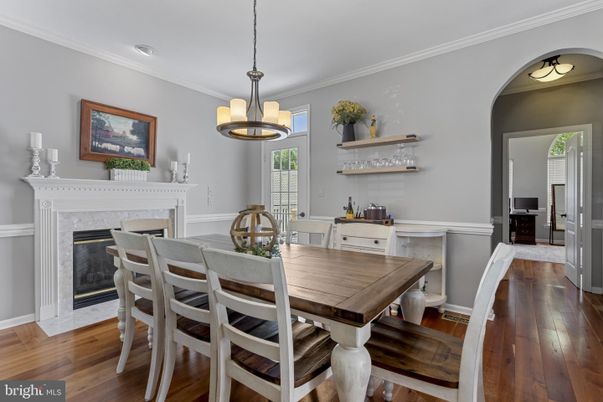 Dining room, Fireplace, Interior, Pendant Lights, Recessed Lighting, Wood Texture Flooring
