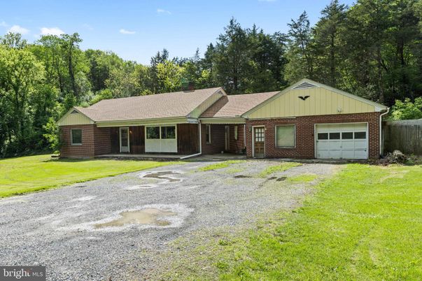 Attached, Backyard, Exterior, Facade, Brick Facade, Ranch