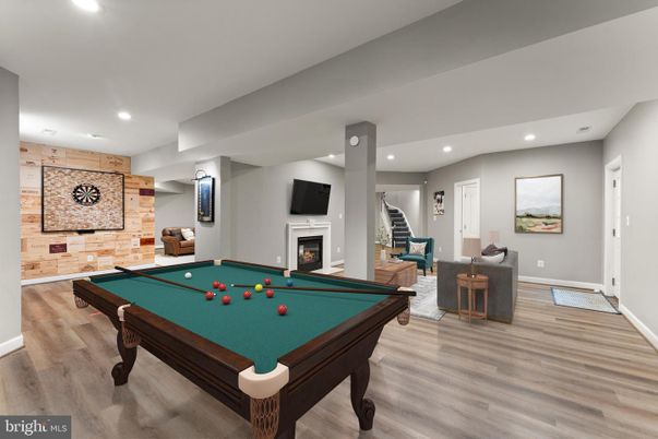 Billiard Table, Fireplace, Game Room, Interior, Recessed Lighting, Stone Walls, Wood Texture Flooring