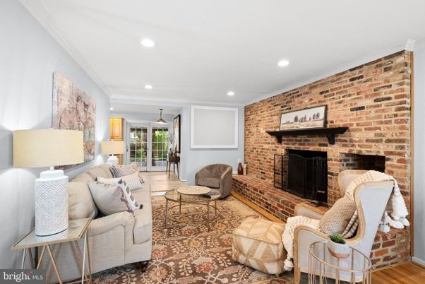 Fireplace, Interior, Living room, Recessed Lighting, Stone Walls, Wood Texture Flooring