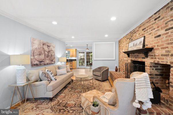 Fireplace, Interior, Living room, Pendant Lights, Recessed Lighting, Stone Walls, Wood Texture Flooring