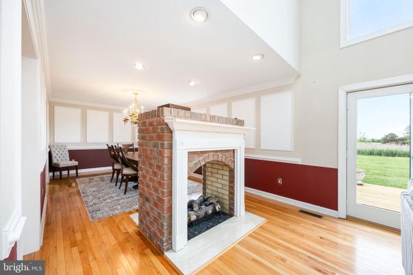 Chandelier, Dining room, Fireplace, Interior, Recessed Lighting, Wood Texture Flooring