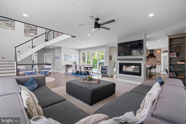 Dining room, Fireplace, Interior, Living room, Recessed Lighting, Wood Texture Flooring