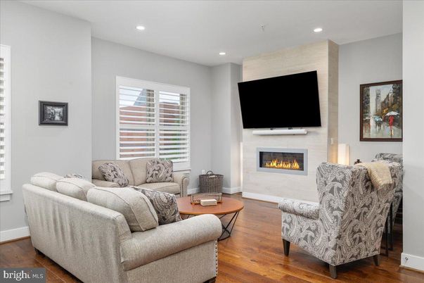 Fireplace, Interior, Living room, Recessed Lighting, Wood Texture Flooring