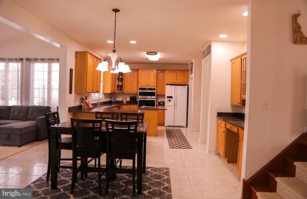 Chandelier, Dining room, Interior, Kitchen, Pendant Lights, Recessed Lighting, Stainless Steel Appliances