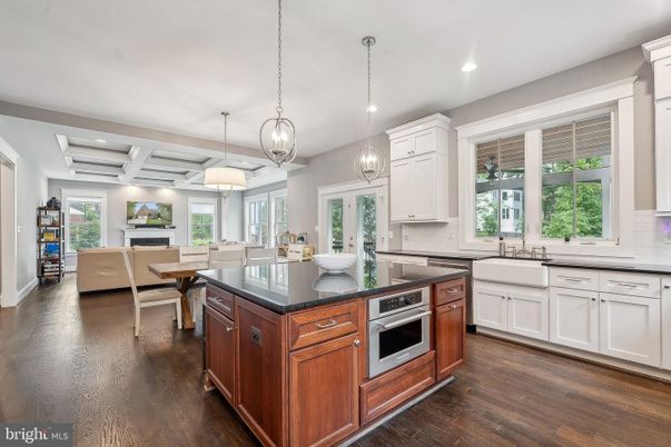 Dining room, Fireplace, Interior, Kitchen, Living room, Pendant Lights, Recessed Lighting, Stainless Steel Appliances, Wood Texture Flooring