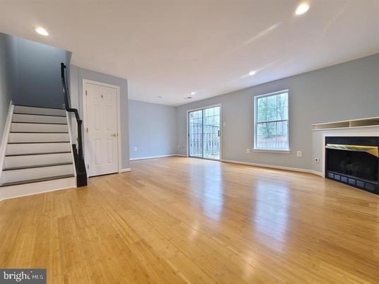 Empty room, Fireplace, Interior, Recessed Lighting, Wood Texture Flooring