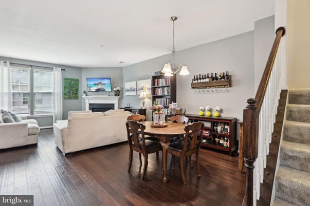 Dining room, Fireplace, Interior, Living room, Pendant Lights, Wood Texture Flooring