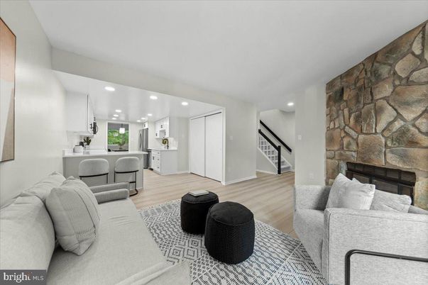Fireplace, Interior, Kitchen, Living room, Recessed Lighting, Stone Walls, Wood Texture Flooring