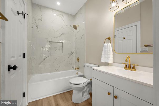 Bathroom, Interior, Marble Walls, Recessed Lighting, Wood Texture Flooring
