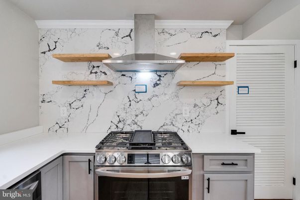Interior, Kitchen, Marble Walls, Stainless Steel Appliances