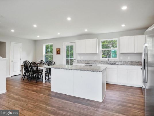 Dining room, Interior, Kitchen, Recessed Lighting, Stainless Steel Appliances, Wood Texture Flooring