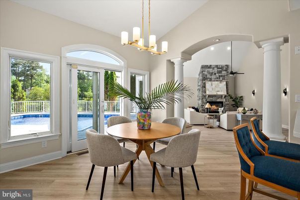 Chandelier, Dining room, Fireplace, Interior, Living room, Pendant Lights, Wood Texture Flooring
