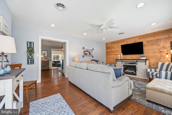 Fireplace, Interior, Living room, Recessed Lighting, Wood Texture Flooring, Wooden Walls