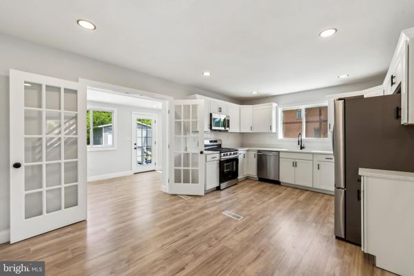 Interior, Kitchen, Recessed Lighting, Stainless Steel Appliances, Wood Texture Flooring