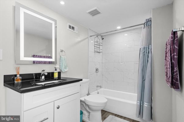 Bathroom, Interior, Marble Walls, Recessed Lighting, Wood Texture Flooring