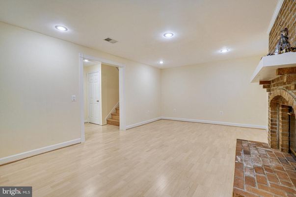 Empty room, Fireplace, Interior, Recessed Lighting, Wood Texture Flooring