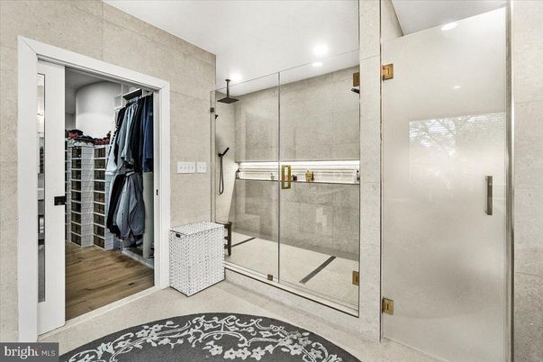Bathroom, Glass Shower, Interior, Recessed Lighting, Walk-in Closets, Wood Texture Flooring
