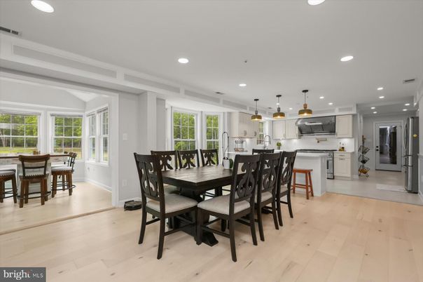 Dining room, Interior, Kitchen, Pendant Lights, Recessed Lighting, Stainless Steel Appliances, Wood Texture Flooring