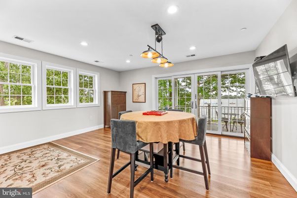 Dining room, Game Room, Interior, Pendant Lights, Recessed Lighting, Wood Texture Flooring