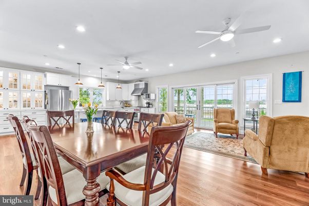 Dining room, Interior, Kitchen, Living room, Pendant Lights, Recessed Lighting, Stainless Steel Appliances, Wood Texture Flooring