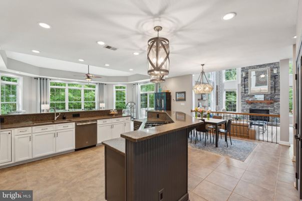 Dining room, Fireplace, Interior, Kitchen, Pendant Lights, Recessed Lighting, Stainless Steel Appliances