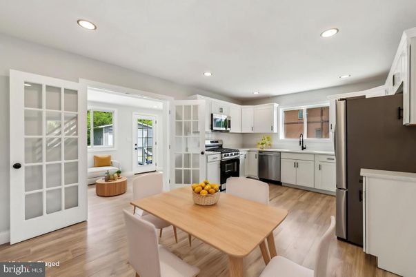 Dining room, Interior, Kitchen, Recessed Lighting, Stainless Steel Appliances, Wood Texture Flooring