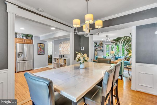 Chandelier, Dining room, Interior, Kitchen, Recessed Lighting, Stainless Steel Appliances, Wood Texture Flooring