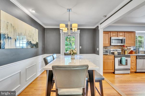 Chandelier, Dining room, Interior, Kitchen, Pendant Lights, Recessed Lighting, Stainless Steel Appliances, Wood Texture Flooring