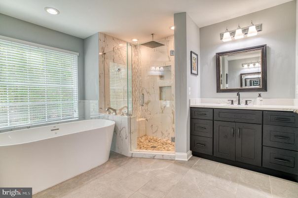 Bathroom, Free Standing Baths, Glass Shower, Interior, Marble Walls, Recessed Lighting