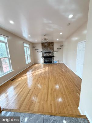 Empty room, Fireplace, Interior, Recessed Lighting, Wood Texture Flooring