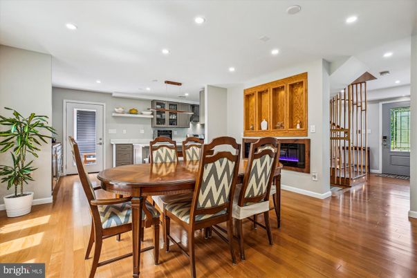 Dining room, Fireplace, Interior, Pendant Lights, Recessed Lighting, Wood Texture Flooring