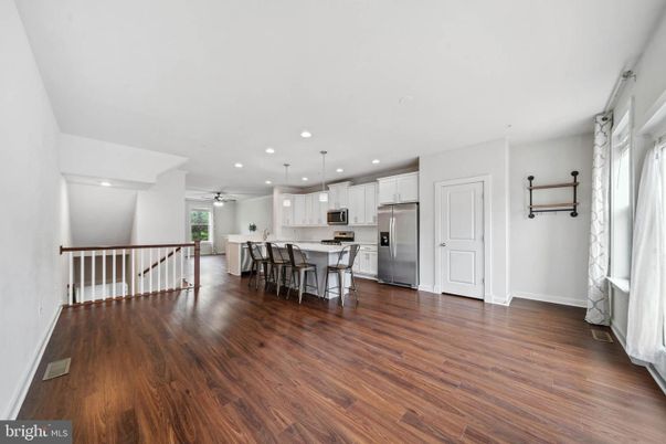 Dining room, Interior, Kitchen, Pendant Lights, Recessed Lighting, Stainless Steel Appliances, Wood Texture Flooring