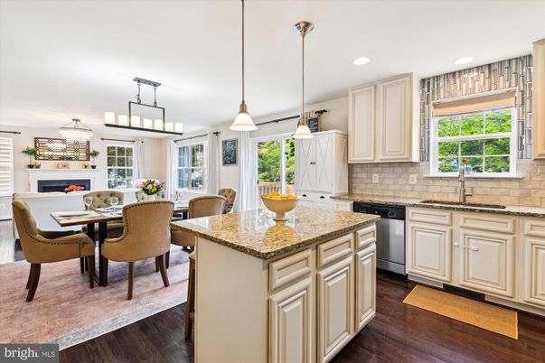 Dining room, Fireplace, Interior, Kitchen, Pendant Lights, Recessed Lighting, Wood Texture Flooring