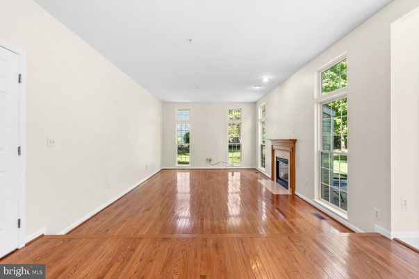 Empty room, Fireplace, Interior, Recessed Lighting, Wood Texture Flooring
