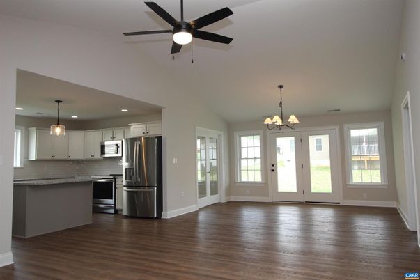 Chandelier, Empty room, Interior, Kitchen, Pendant Lights, Recessed Lighting, Stainless Steel Appliances, Wood Texture Flooring
