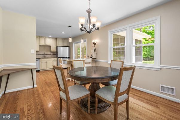 Chandelier, Dining room, Interior, Kitchen, Pendant Lights, Recessed Lighting, Stainless Steel Appliances, Wood Texture Flooring