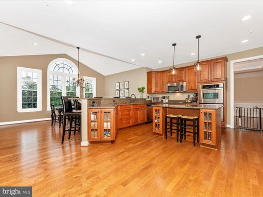 Chandelier, Dining room, Interior, Kitchen, Pendant Lights, Recessed Lighting, Stainless Steel Appliances, Wood Texture Flooring