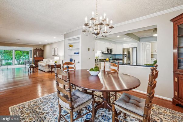 Chandelier, Dining room, Interior, Kitchen, Living room, Recessed Lighting, Stainless Steel Appliances, Wood Texture Flooring