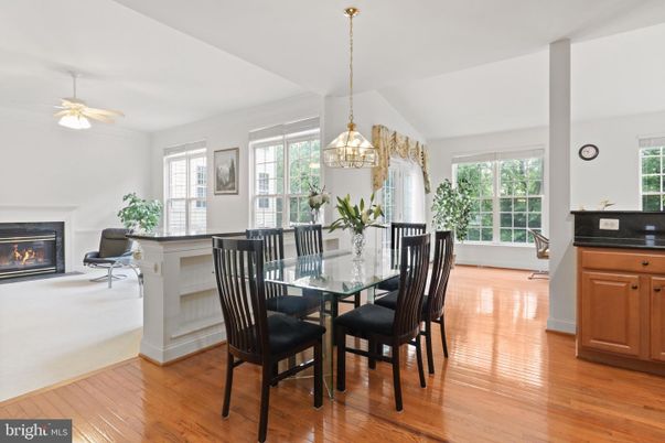 Dining room, Fireplace, Interior, Pendant Lights, Wood Texture Flooring