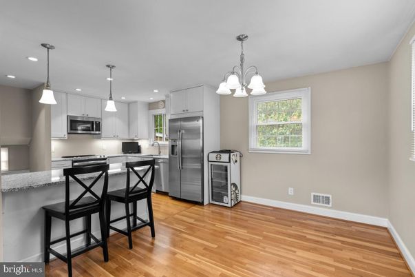 Chandelier, Interior, Kitchen, Pendant Lights, Recessed Lighting, Stainless Steel Appliances, Wood Texture Flooring