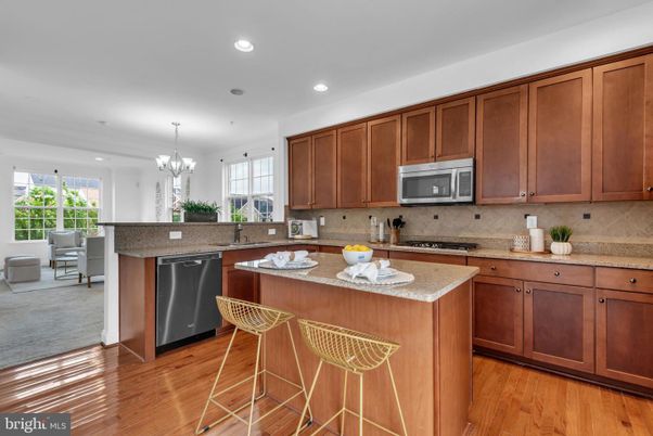 Chandelier, Interior, Kitchen, Recessed Lighting, Stainless Steel Appliances, Wood Texture Flooring