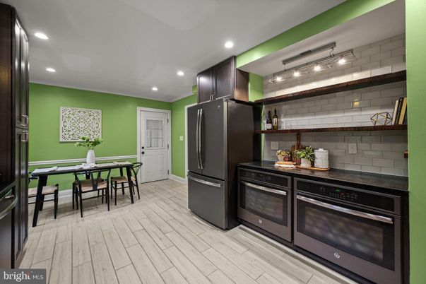 Dining room, Interior, Kitchen, Recessed Lighting, Stainless Steel Appliances, Wood Texture Flooring