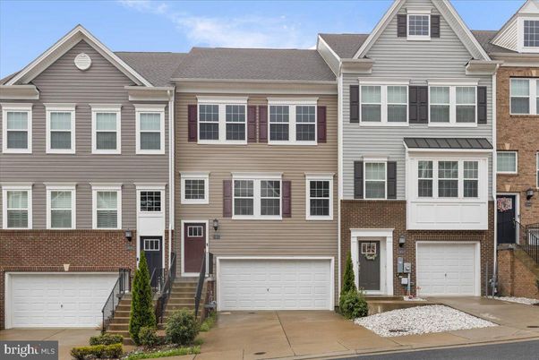 Attached, Exterior, Facade, Brick Facade, Rowhouse