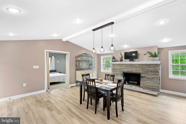 Bedroom, Dining room, Fireplace, Interior, Pendant Lights, Recessed Lighting, Wood Texture Flooring