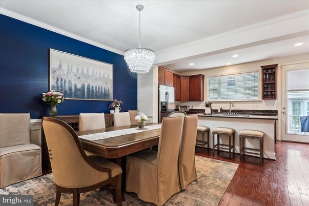 Chandelier, Dining room, Interior, Kitchen, Recessed Lighting, Stainless Steel Appliances, Wood Texture Flooring