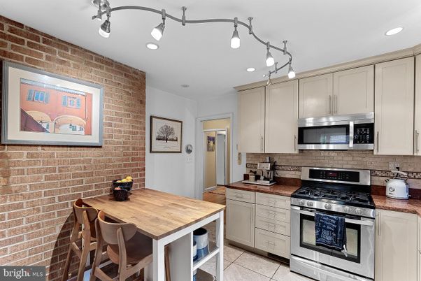 Interior, Kitchen, Recessed Lighting, Stainless Steel Appliances, Stone Walls
